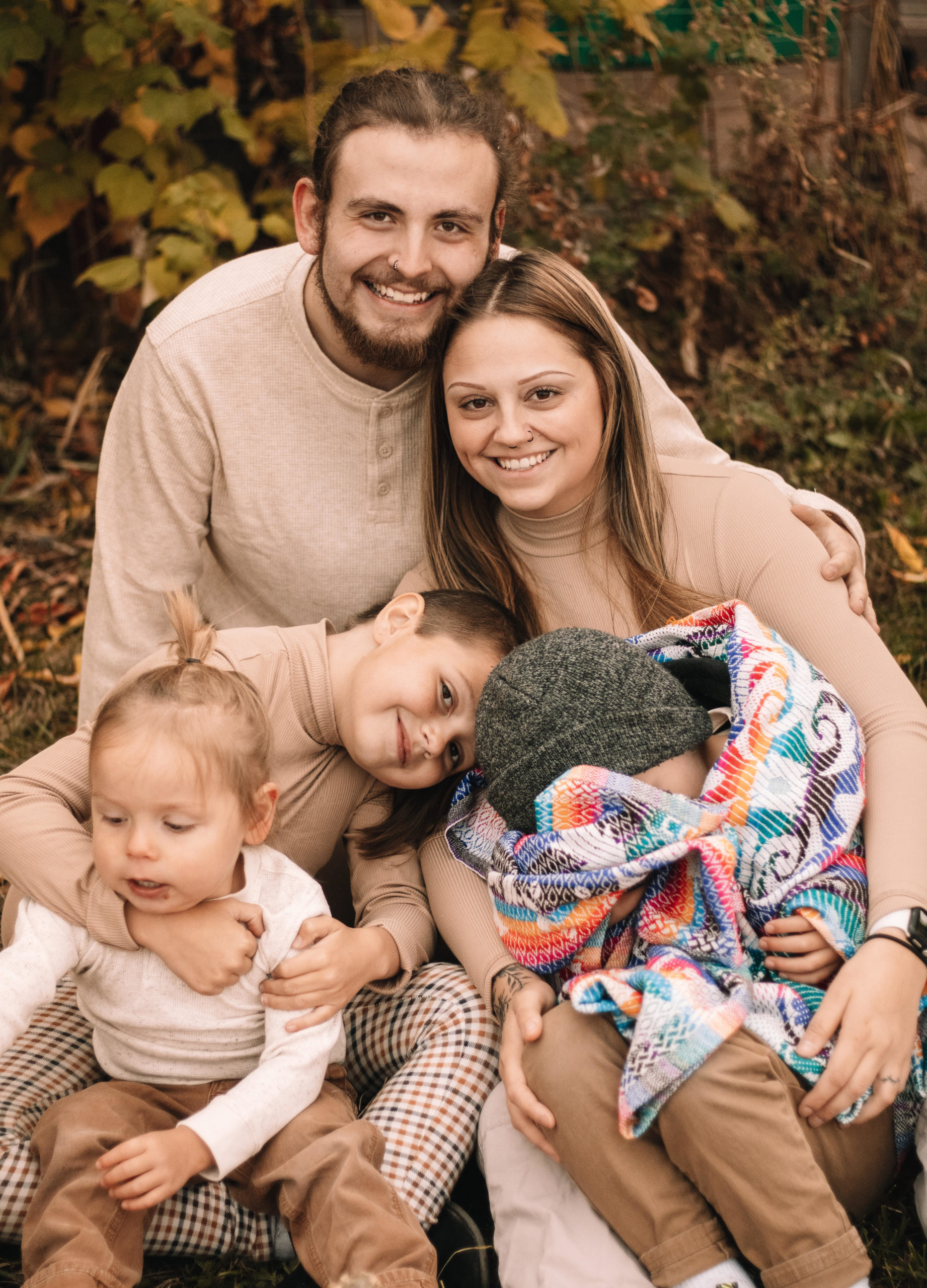 a happy family in a fall scene